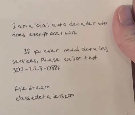 Handwritten letter being written